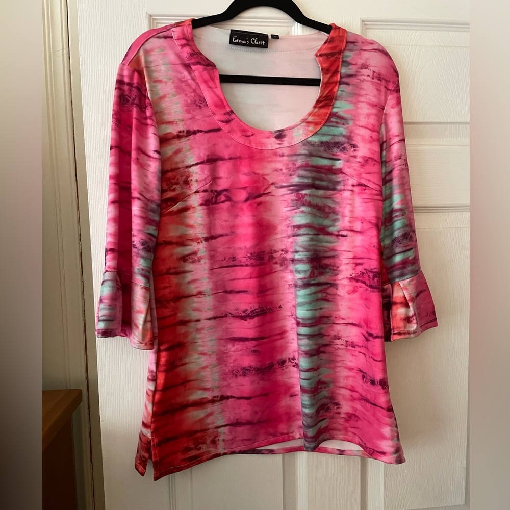 Beautiful, bright colored blouse.